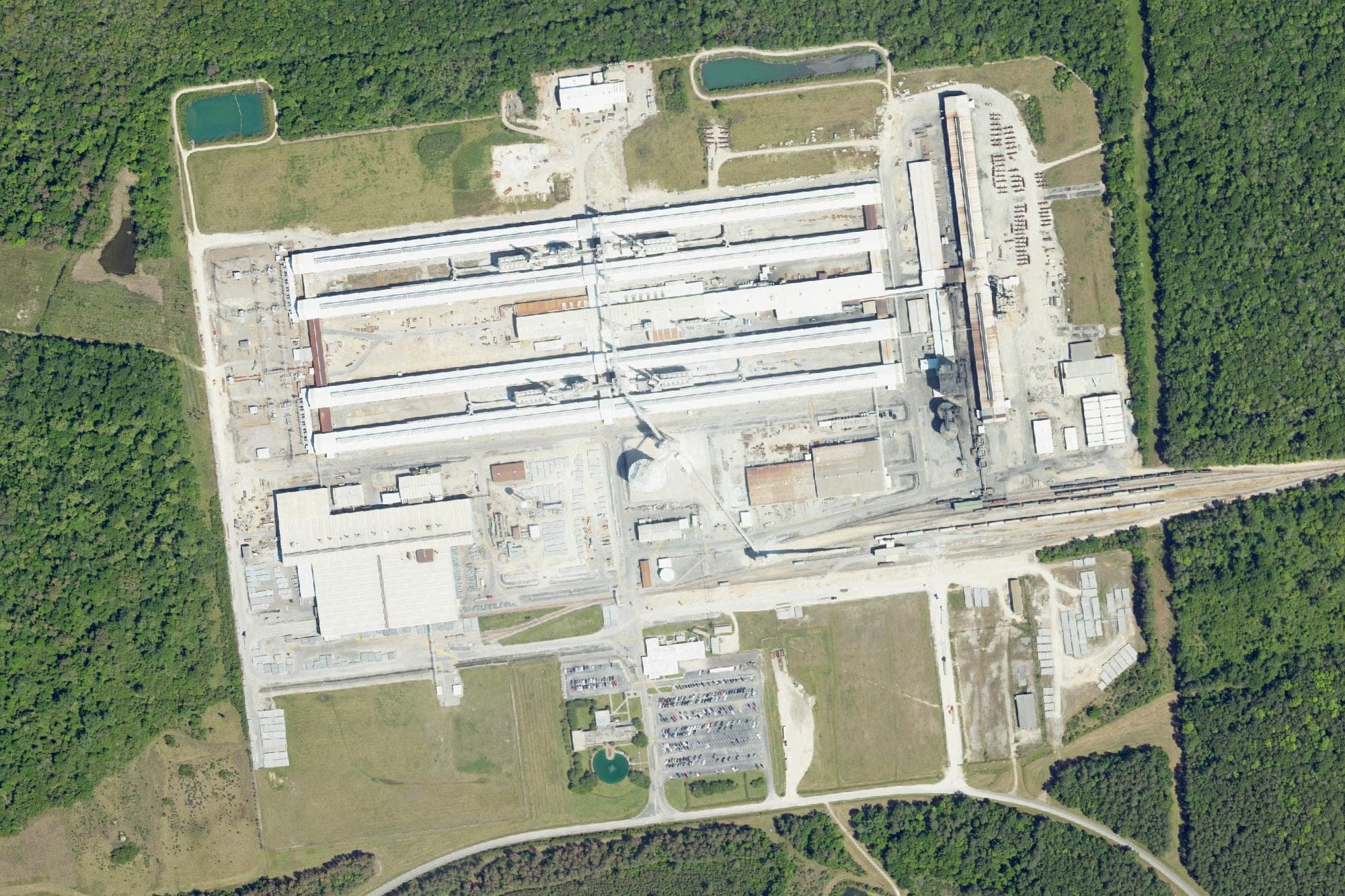 Century Aluminum's Mt. Holly smelter off U.S. 52 near Goose Creek, with its long potline buildings at center, seen in a U.S. Department of Agriculture aerial image from April 2023, when part of the plant was still idle.