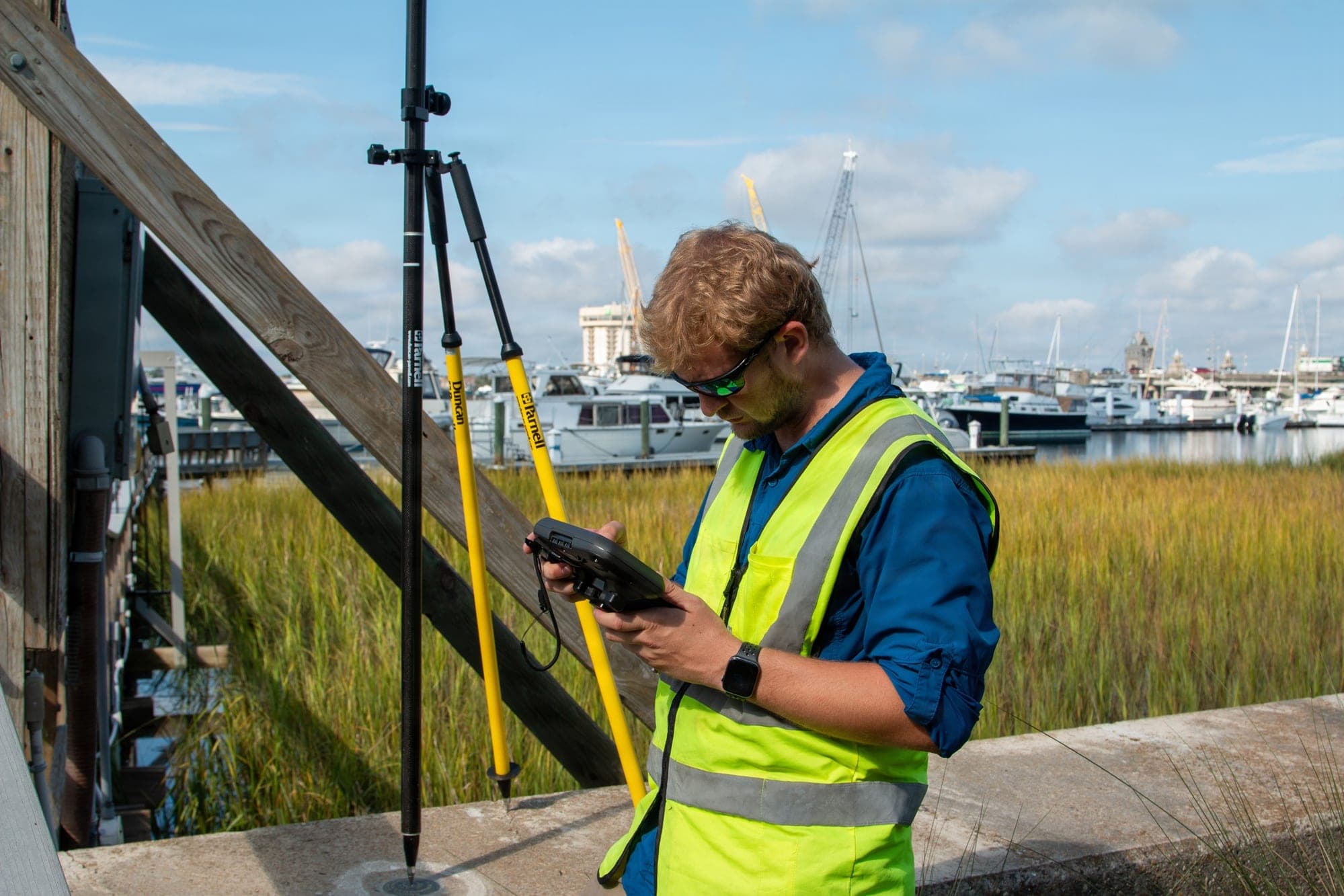 Derek Thorn, a geographer with the Army Corps of Engineers' Charleston District, conducts topographic surveys near Brittlebank Park and the Ashley River bridges in downtown Charleston on Sept. 11, 2026, for the planned storm surge barrier.