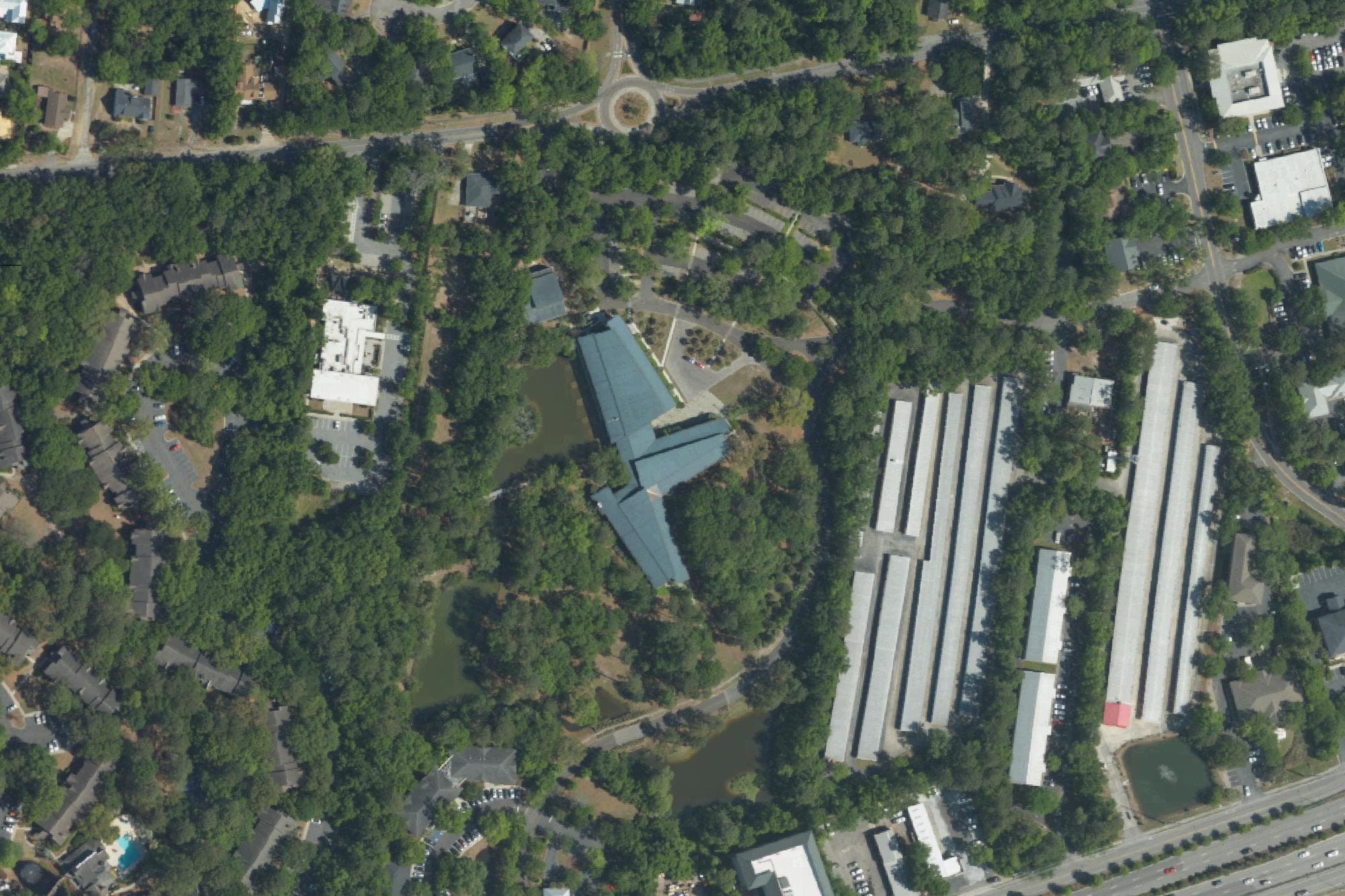 The building at 11 eWall St. in Mount Pleasant, the blue-roofed structure at center, in a U.S. Department of Agriculture aerial image taken April 18, 2023. The Harbor Entrepreneur Center moved there in 2023, according to its board chair; the image may predate the move.