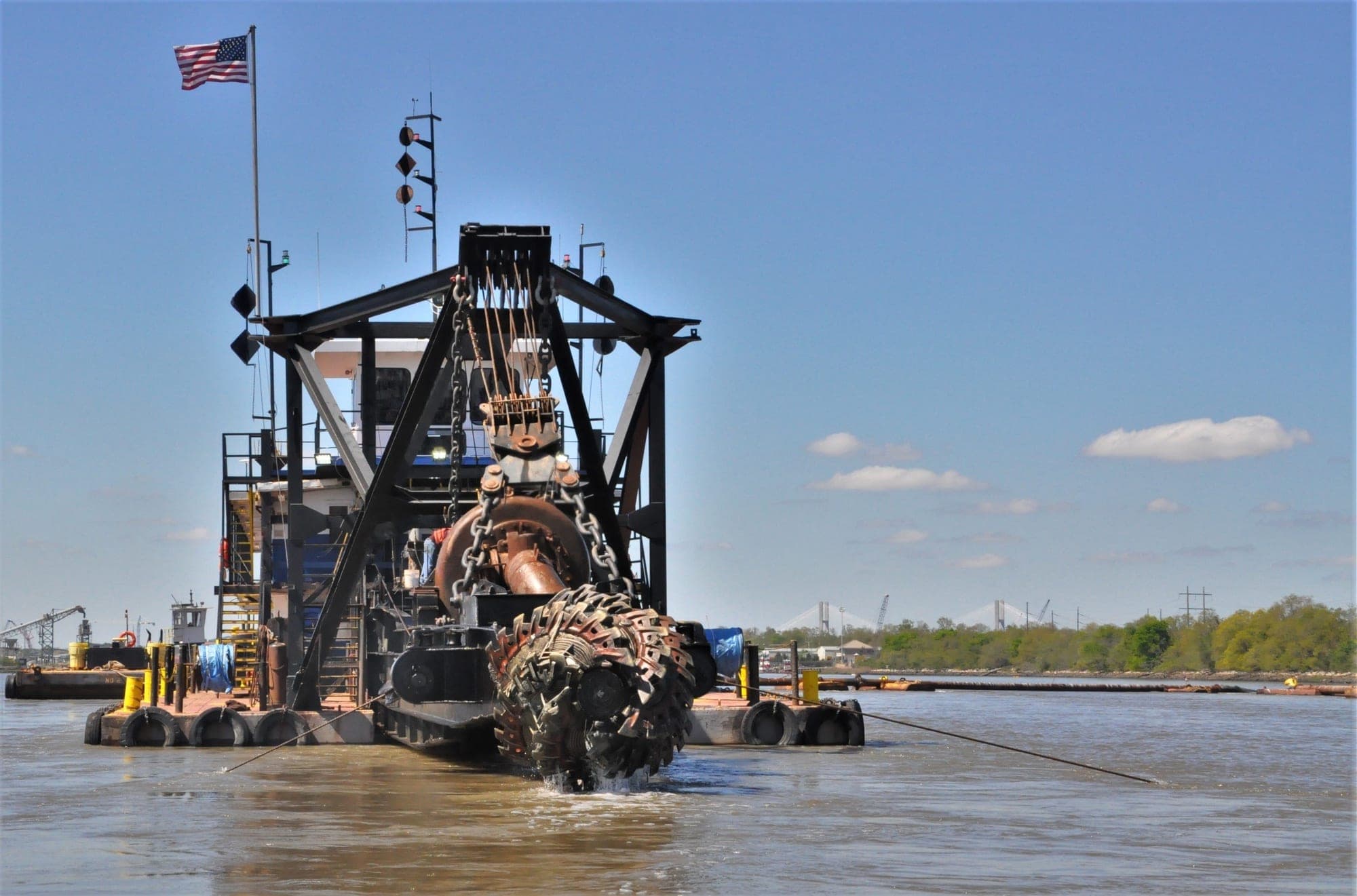 The dredge Hampton Roads raises its cutter head for maintenance during Savannah River maintenance dredging overseen by the Army Corps of Engineers in March 2019. A Corps photo from the same day identifies a Marinex safety officer aboard the dredge.