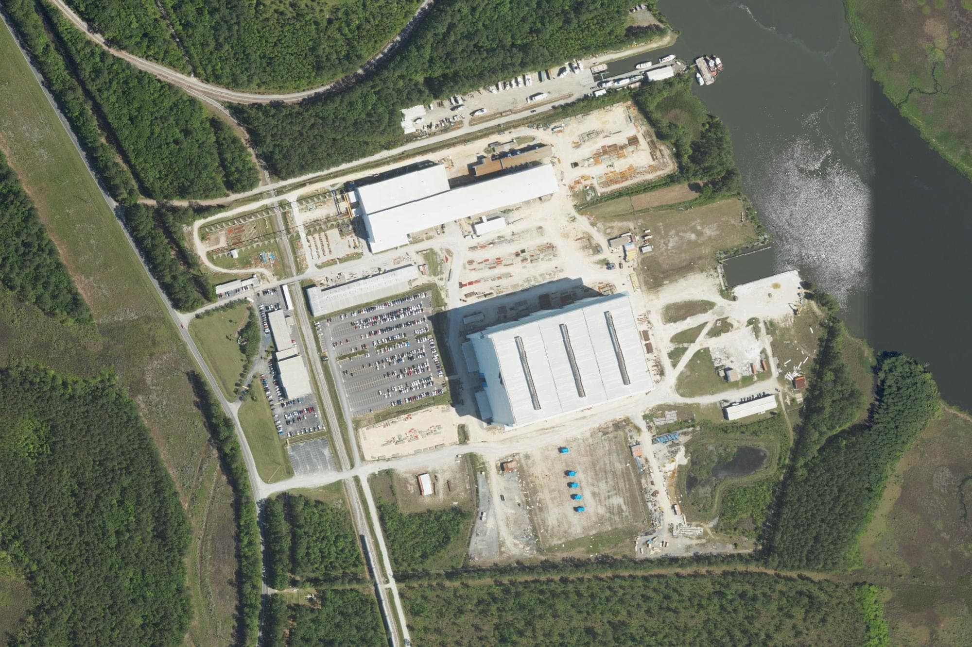 The manufacturing site at center, along the Cooper River in Goose Creek, seen in a U.S. Department of Agriculture aerial image from April 2023, when W International operated it. Newport News Shipbuilding bought the plant's assets in January 2025.