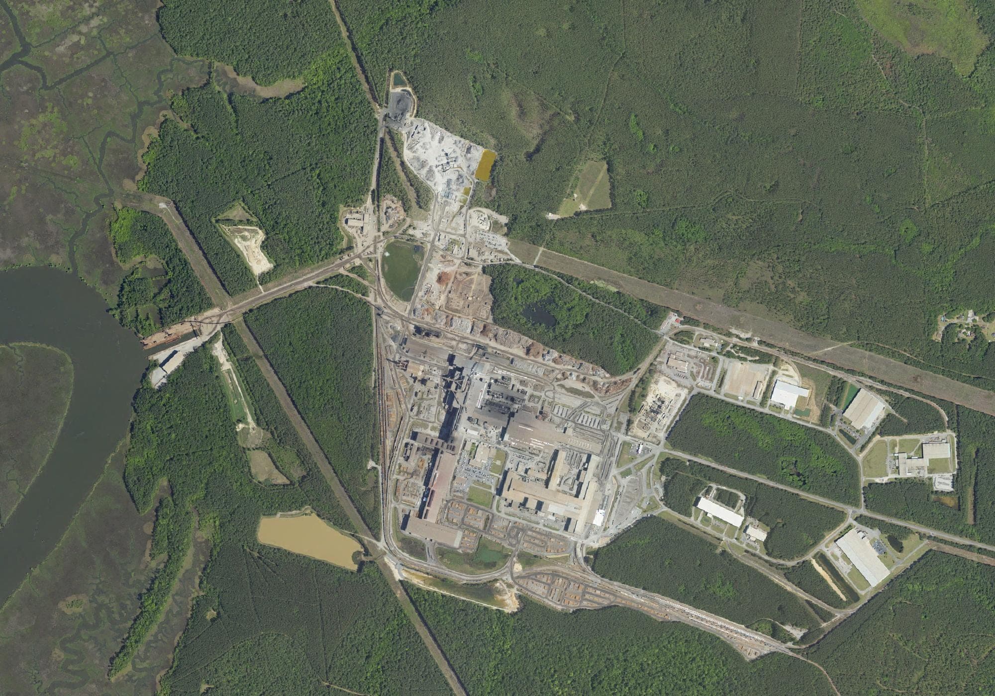 Aerial imagery taken April 18, 2023, shows the Nucor Steel Berkeley mill along the Cooper River near Huger, about a year before Nucor broke ground on a second galvanizing line there.
