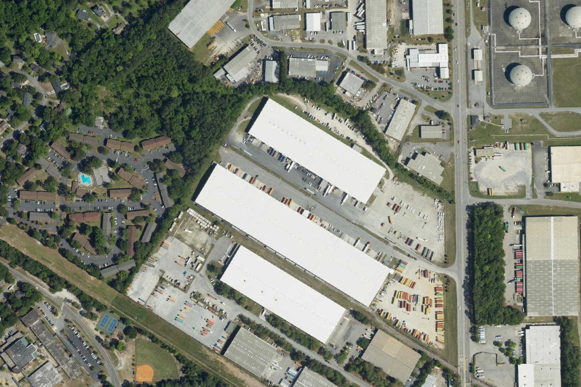 North Rhett Center's two warehouses, the top two of the three white-roofed buildings at center, sit off North Rhett Avenue, right, in Hanahan in a U.S. Department of Agriculture aerial image from April 2023.