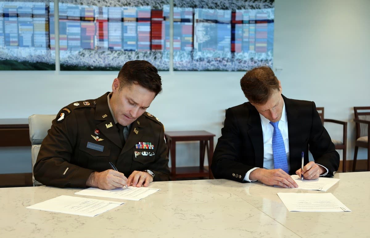 Lt. Col. Todd Mainwaring, commander of the Army Corps of Engineers' Charleston District, left, and SC Ports President and CEO Micah Mallace sign a feasibility cost-sharing agreement at SC Ports headquarters in Mount Pleasant on Aug. 28, 2026.